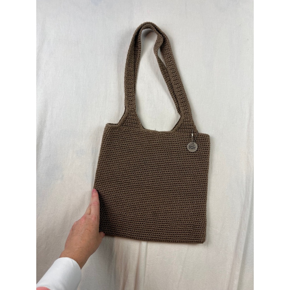 The Sak Brown Crochet Shoulder Bag Hobo Tote Magnetic Snap Closure Logo Charm